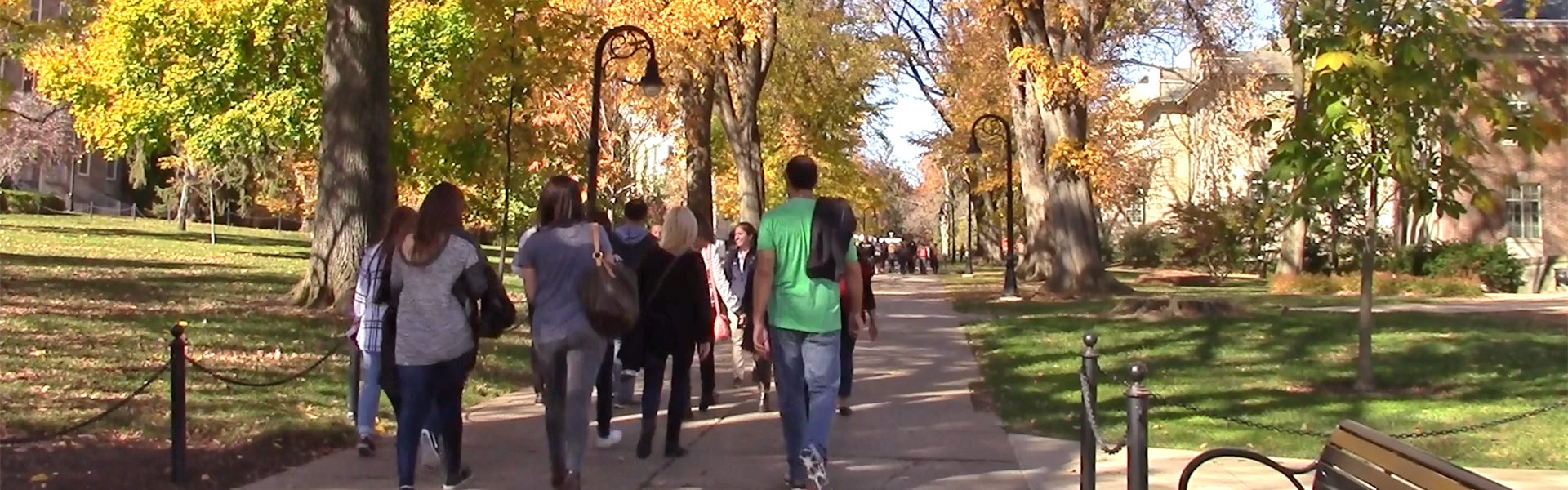 students walking across Penn State campus